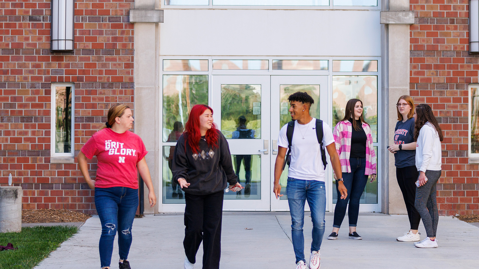 Students walking outside on city campus