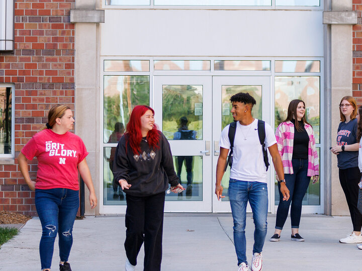 Students walking outside on city campus